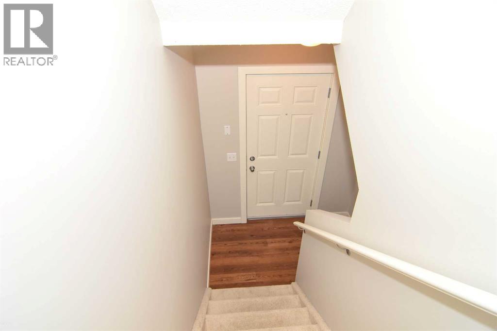 156 Pantego Lane Nw, Calgary, Alberta  T3K 0T1 - Photo 19 - A2260230