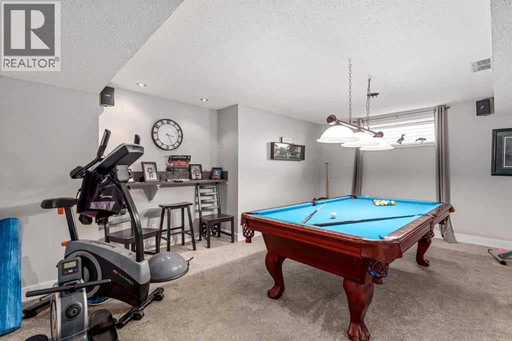 110 Rocky Ridge Green Nw, Calgary, Alberta  T3G 4R6 - Photo 34 - A2261679