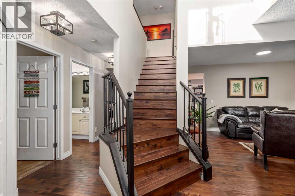 110 Rocky Ridge Green Nw, Calgary, Alberta  T3G 4R6 - Photo 3 - A2261679