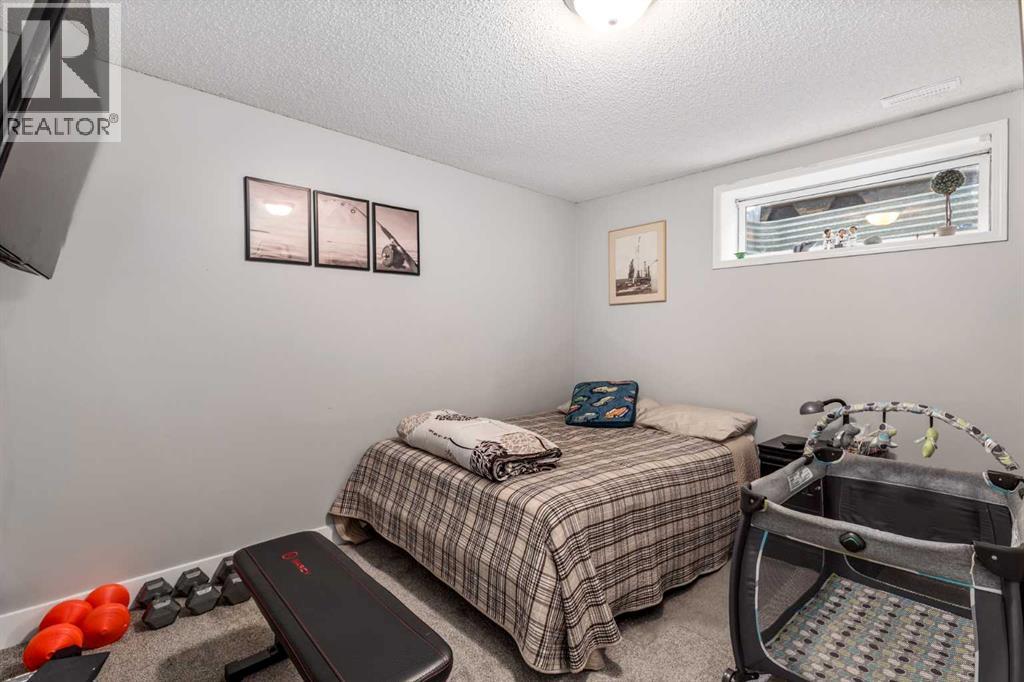 110 Rocky Ridge Green Nw, Calgary, Alberta  T3G 4R6 - Photo 35 - A2261679