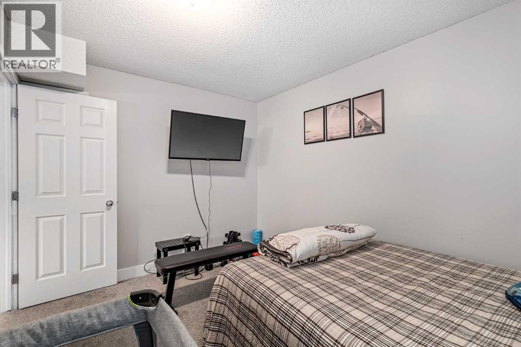 110 Rocky Ridge Green Nw, Calgary, Alberta  T3G 4R6 - Photo 36 - A2261679