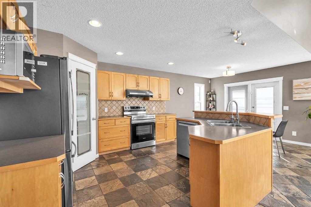 138 Panamount Gardens Nw, Calgary, Alberta  T3K 5V4 - Photo 9 - A2261878