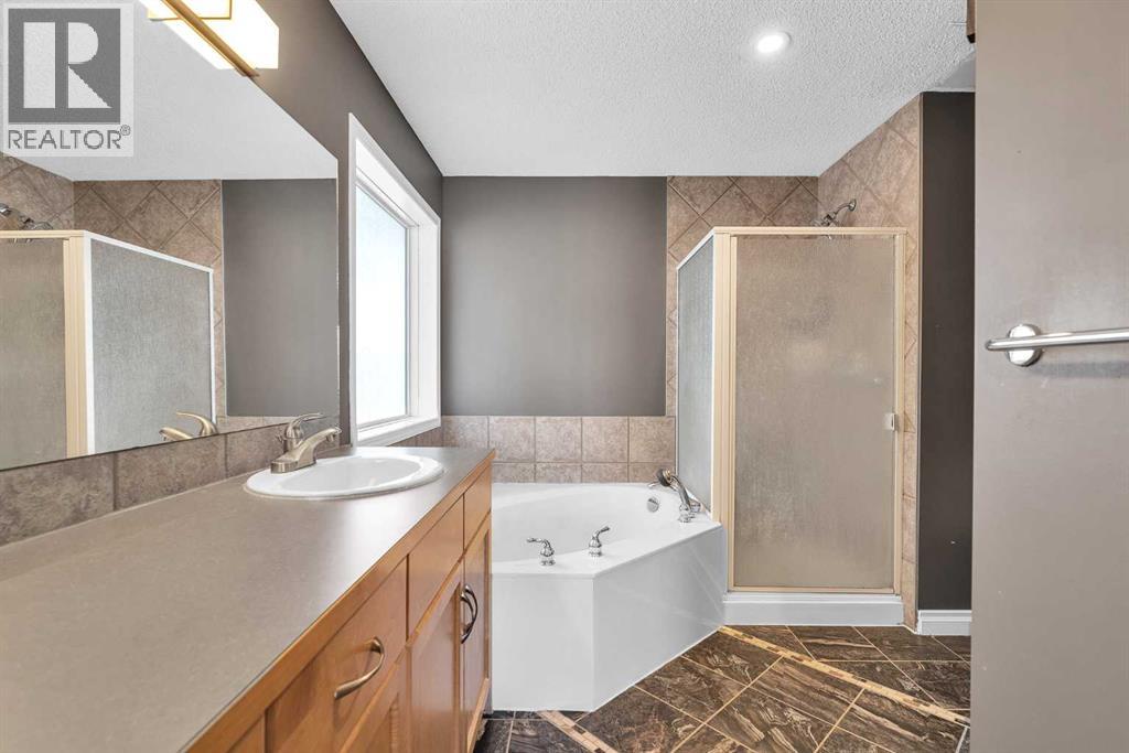 138 Panamount Gardens Nw, Calgary, Alberta  T3K 5V4 - Photo 24 - A2261878