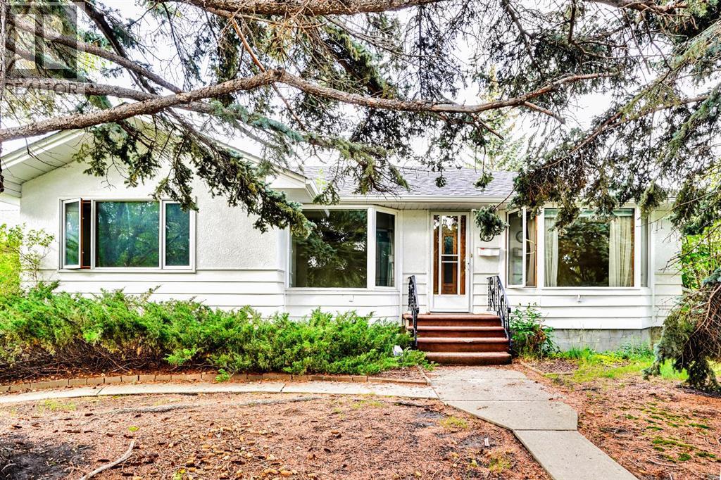 1956 Kelwood Drive Sw, Calgary, Alberta  T3E 3Z3 - Photo 1 - A2258748