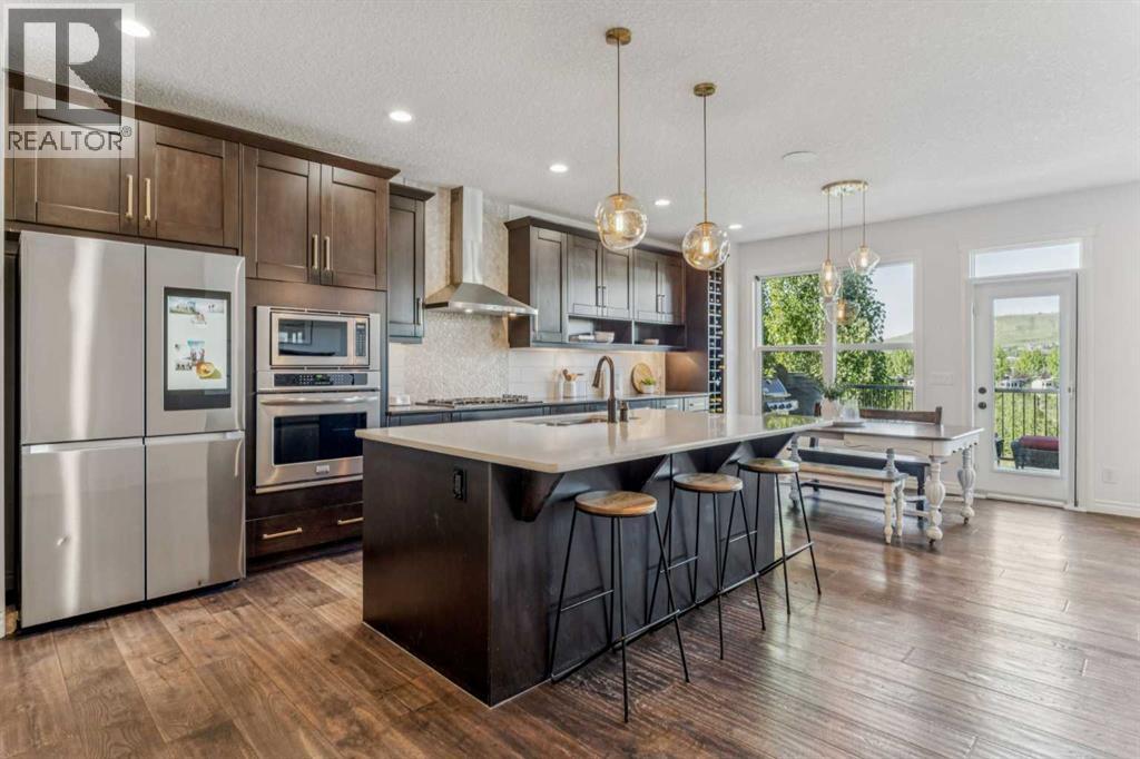 50 Riviera View, Cochrane, Alberta  T4C 0Y7 - Photo 4 - A2257769