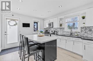 85 Kane Avenue, Toronto, Ontario  M6M 3M8 - Photo 3 - W12446097