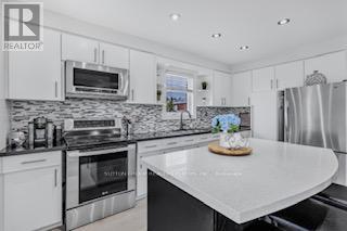85 Kane Avenue, Toronto, Ontario  M6M 3M8 - Photo 5 - W12446097