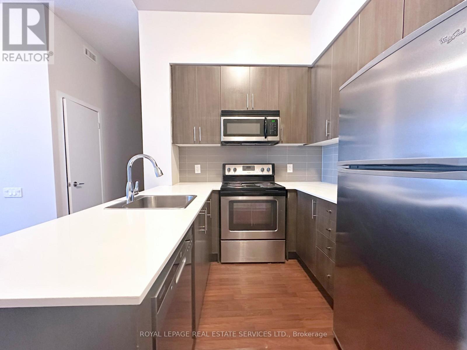 410 - 188 Clark Boulevard, Brampton, Ontario  L6T 0J2 - Photo 2 - W12446233