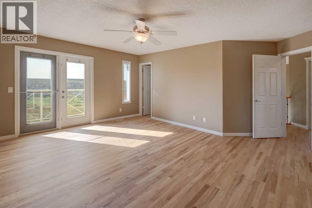 99 Hidden Creek Point Nw, Calgary, Alberta  T3A 6J7 - Photo 24 - A2257857