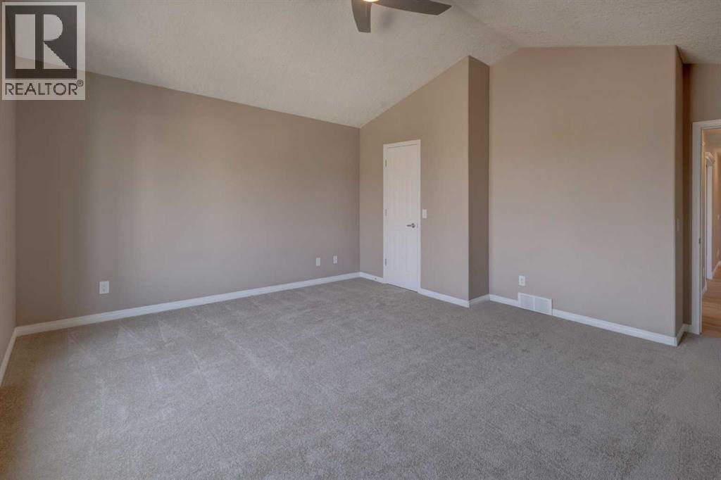 99 Hidden Creek Point Nw, Calgary, Alberta  T3A 6J7 - Photo 34 - A2257857