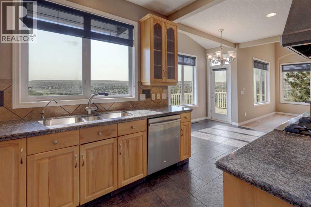 99 Hidden Creek Point Nw, Calgary, Alberta  T3A 6J7 - Photo 7 - A2257857