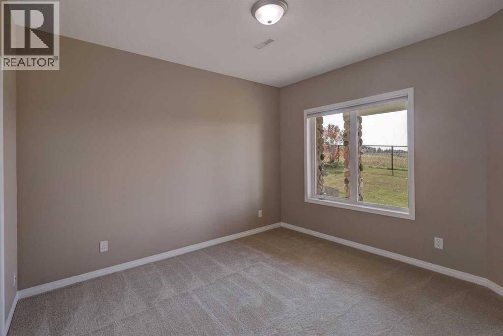 99 Hidden Creek Point Nw, Calgary, Alberta  T3A 6J7 - Photo 44 - A2257857