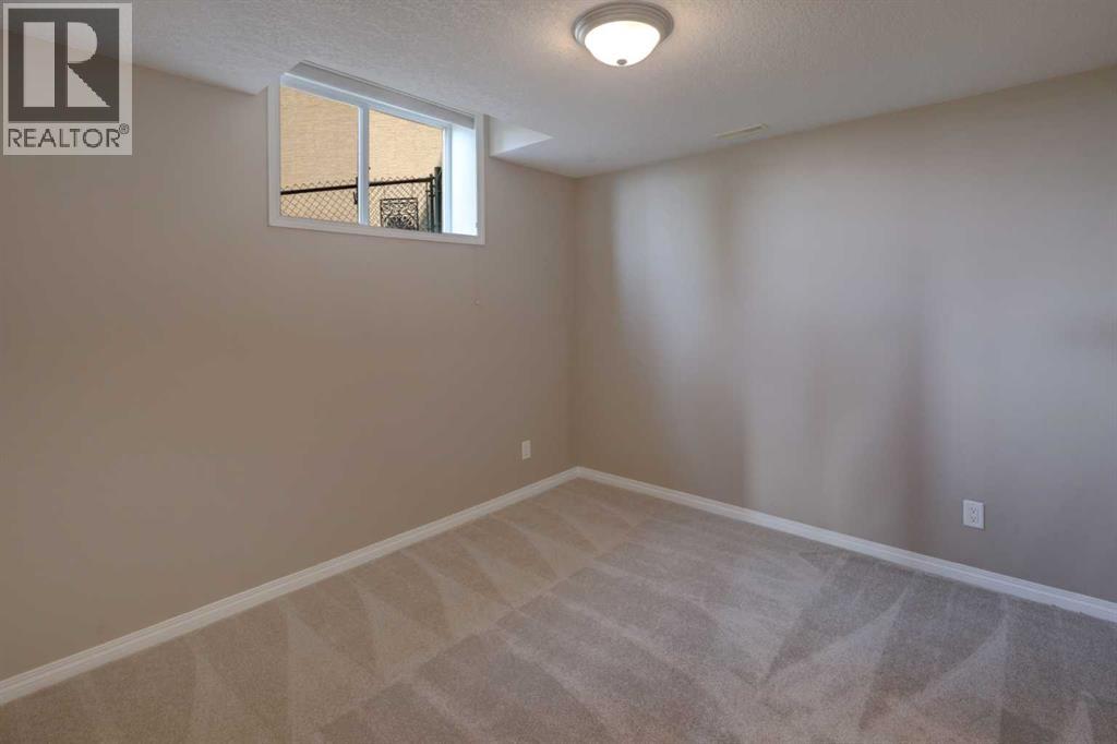 99 Hidden Creek Point Nw, Calgary, Alberta  T3A 6J7 - Photo 45 - A2257857