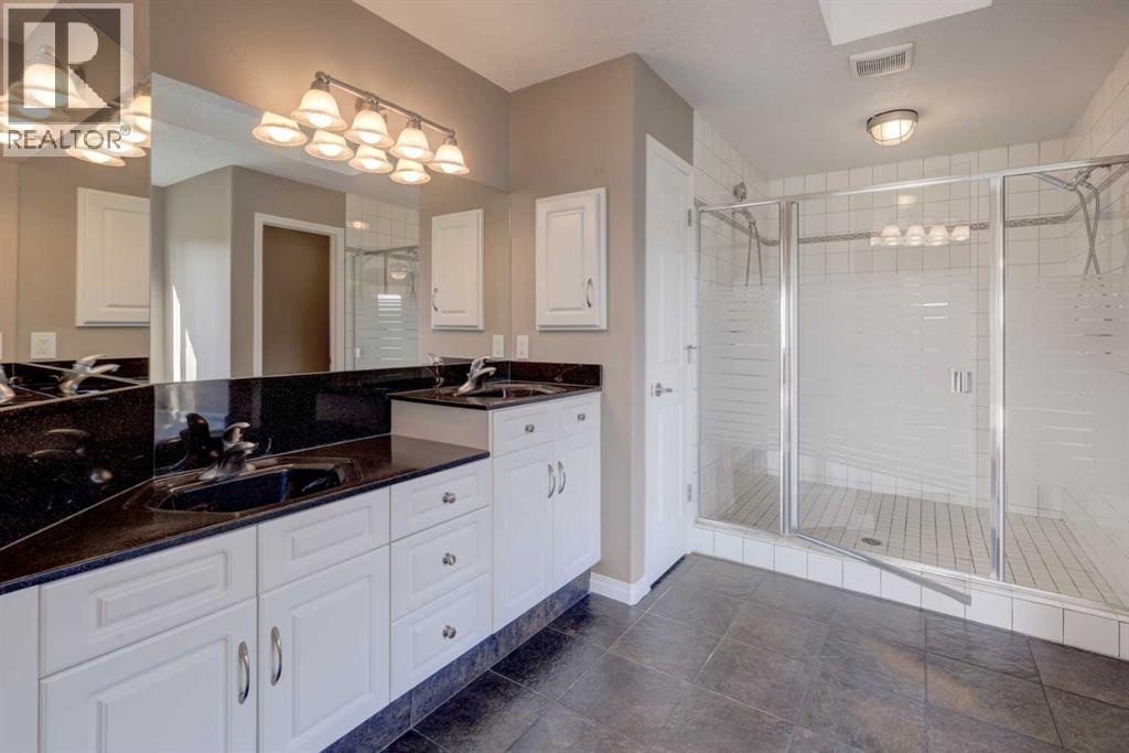 99 Hidden Creek Point Nw, Calgary, Alberta  T3A 6J7 - Photo 26 - A2257857
