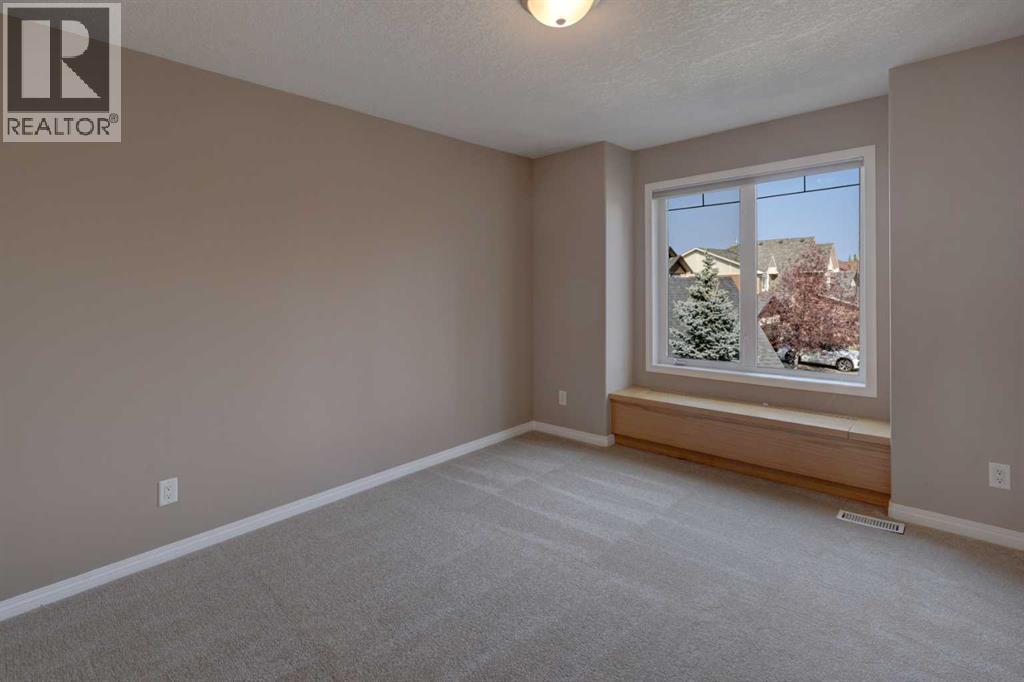 99 Hidden Creek Point Nw, Calgary, Alberta  T3A 6J7 - Photo 36 - A2257857