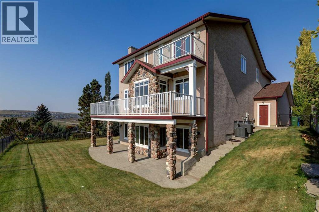 99 Hidden Creek Point Nw, Calgary, Alberta  T3A 6J7 - Photo 49 - A2257857