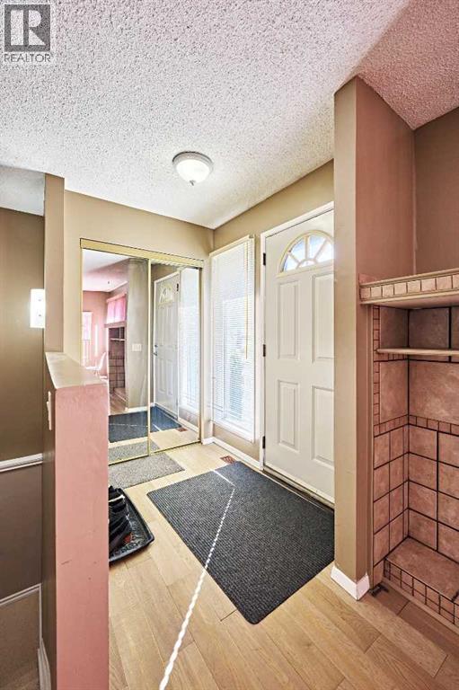 8414 Berwick Road Nw, Calgary, Alberta  T3K 1E5 - Photo 3 - A2259911