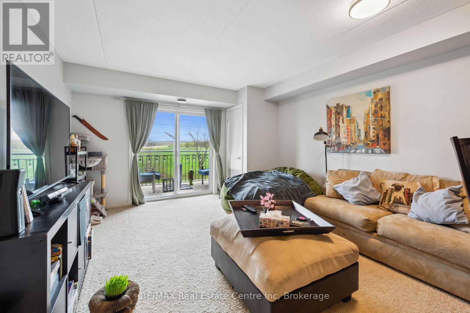 303 - 19 Waterford Drive, Guelph, Ontario  N1L 0G8 - Photo 6 - X12446528