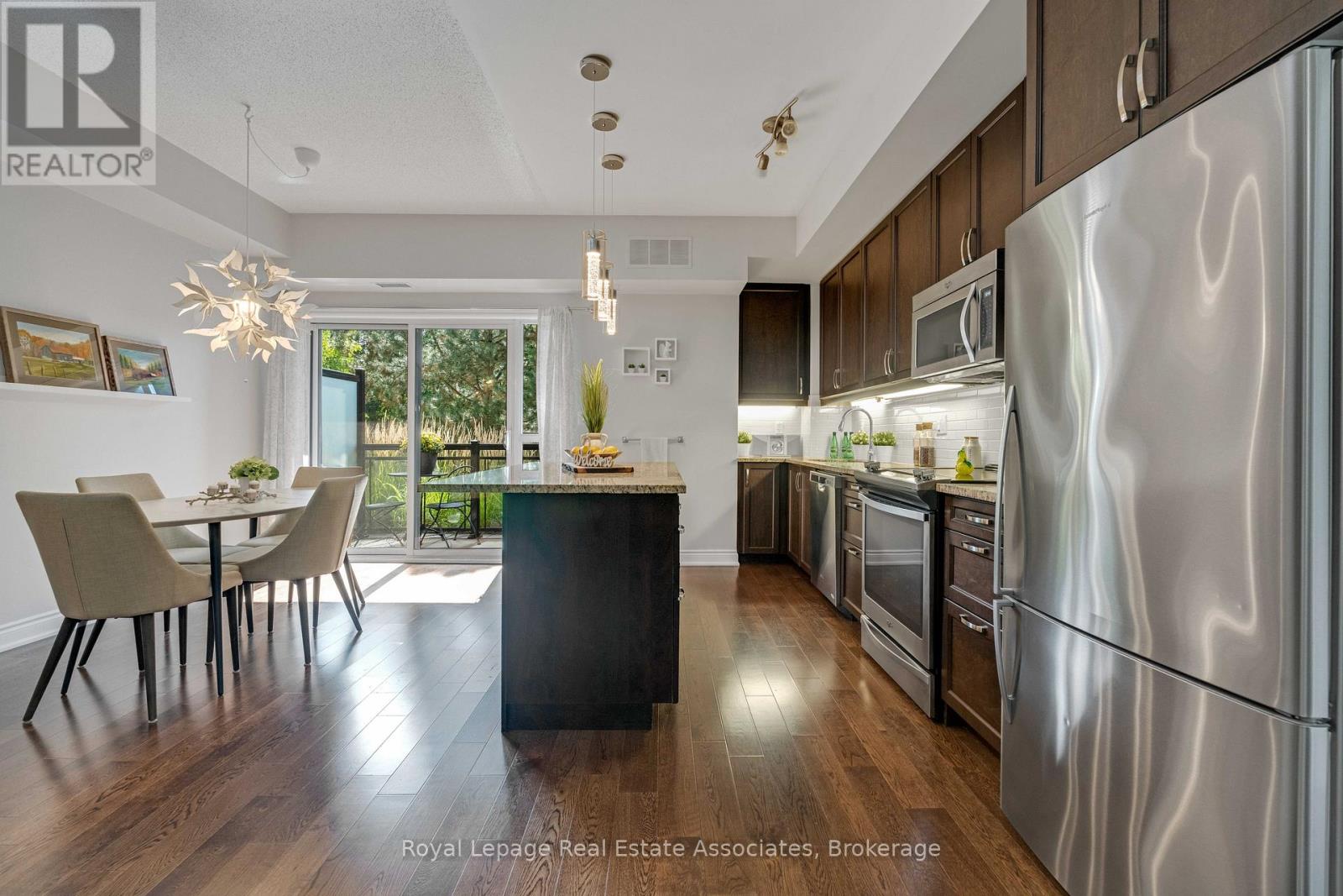 108 - 3170 Erin Mills Parkway, Mississauga, Ontario  L5L 0B6 - Photo 2 - W12379669