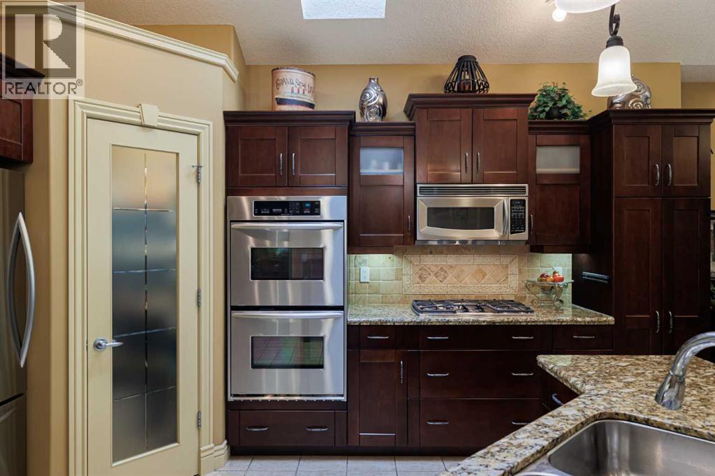 38 Tuscany Glen Park Nw, Calgary, Alberta  T3L 2T7 - Photo 8 - A2257152