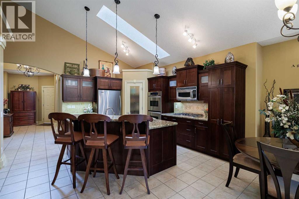 38 Tuscany Glen Park Nw, Calgary, Alberta  T3L 2T7 - Photo 6 - A2257152