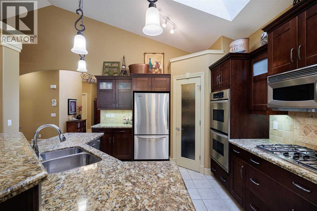 38 Tuscany Glen Park Nw, Calgary, Alberta  T3L 2T7 - Photo 7 - A2257152