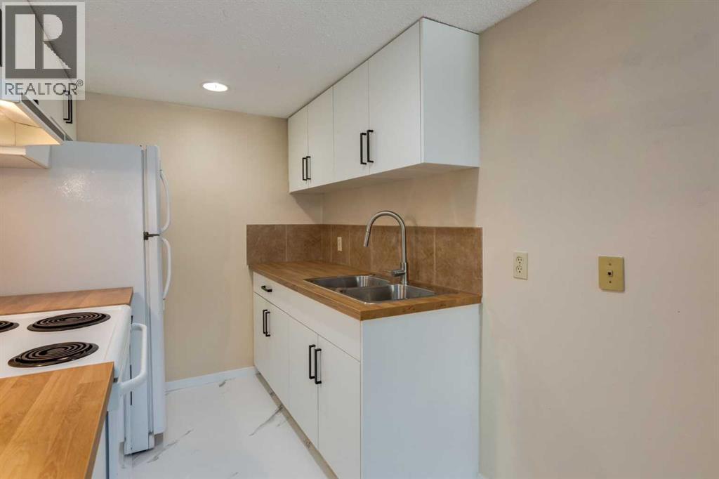 221, 200 Brookpark Drive Sw, Calgary, Alberta  T2W 3E5 - Photo 7 - A2258123