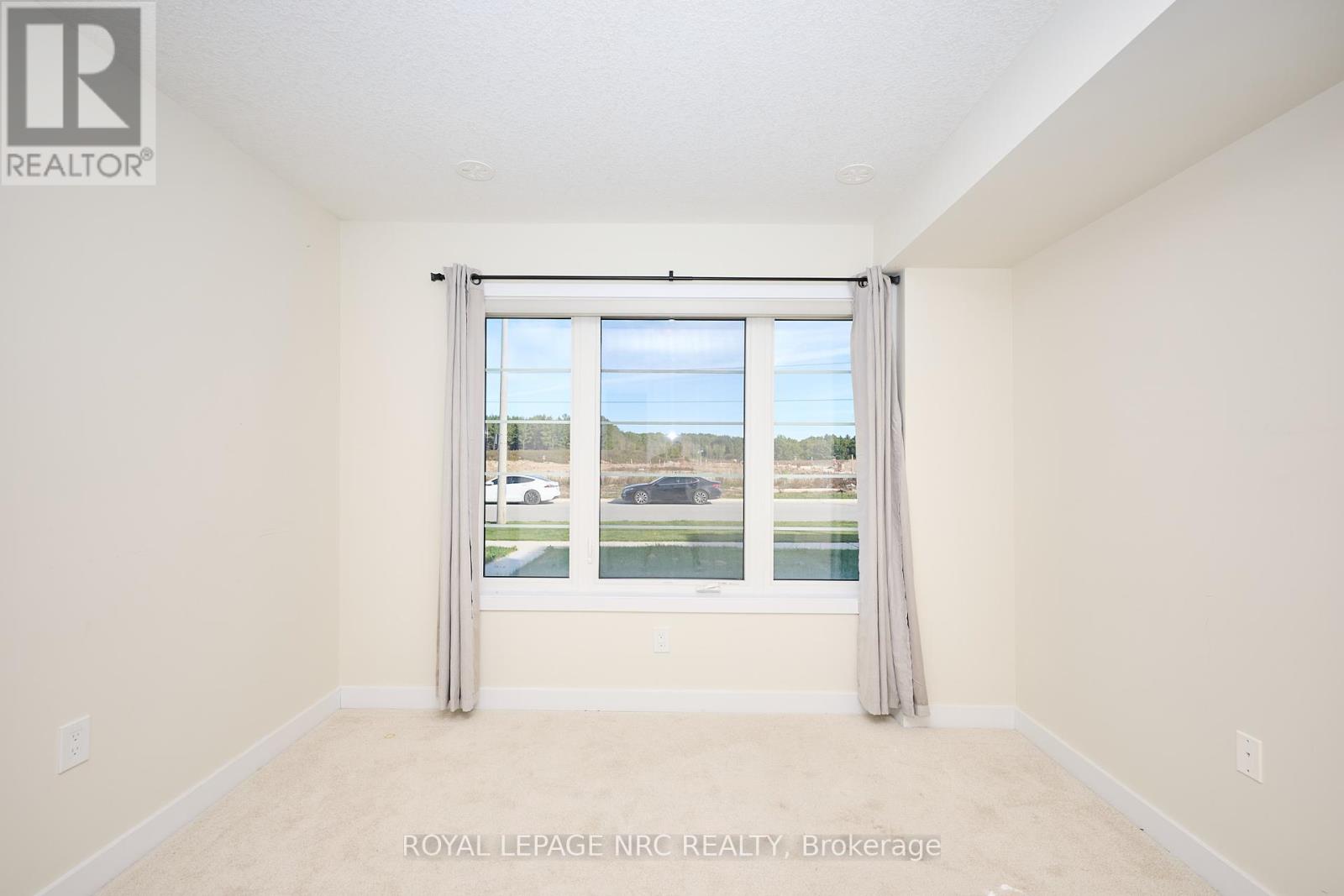11 Melody Lane, Thorold, Ontario  L5B 5N5 - Photo 6 - X12446551