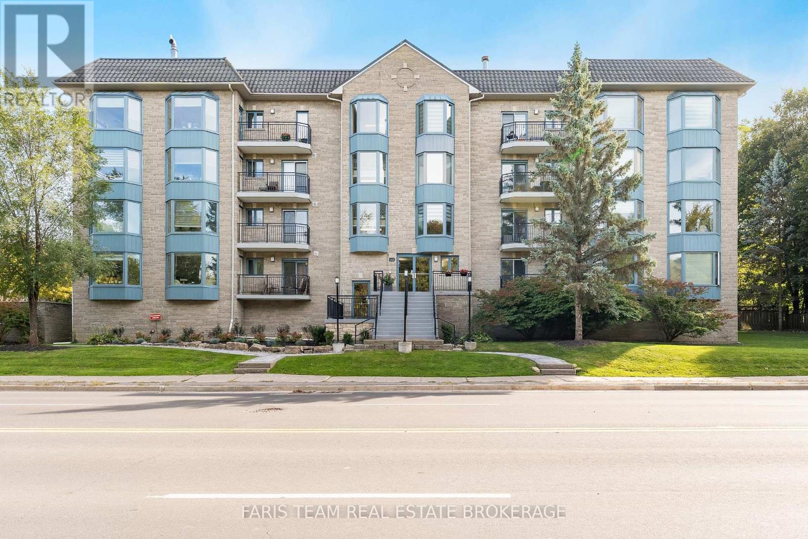 307 - 85 Wellington Street W, Aurora (Aurora Village), Ontario  L4G 2P2 - Photo 1 - N12446482
