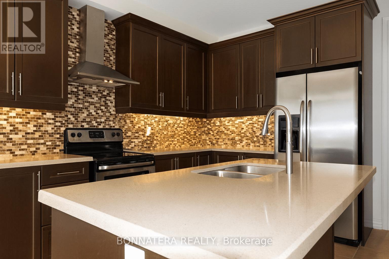 230 Jessie Caverhill Pass, Oakville, Ontario  L6M 0Z6 - Photo 6 - W12446681