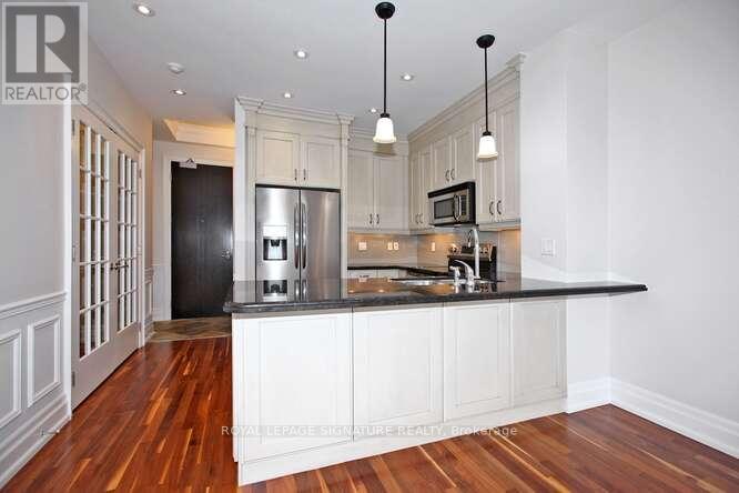 401 - 20 Burkebrook Place, Toronto, Ontario  M4G 0A1 - Photo 4 - C12446736