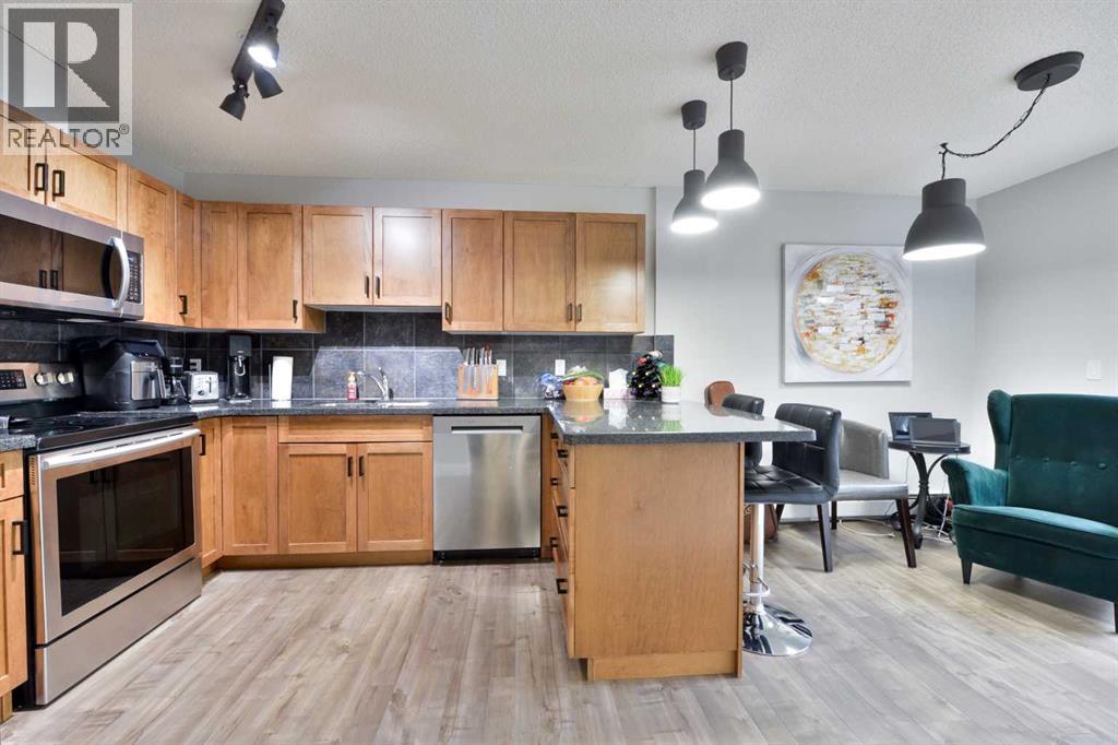 8, 301 Village Mews Sw, Calgary, Alberta  T3H 2L3 - Photo 6 - A2248553