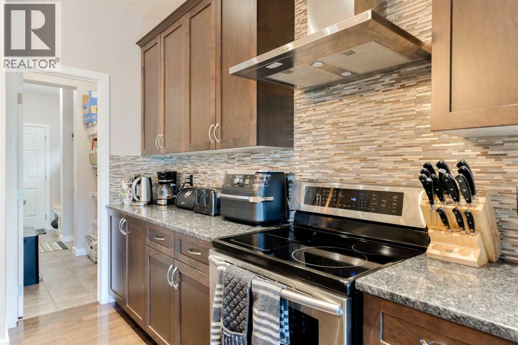 40 Sunrise Terrace, Cochrane, Alberta  T4C 0V3 - Photo 9 - A2248798