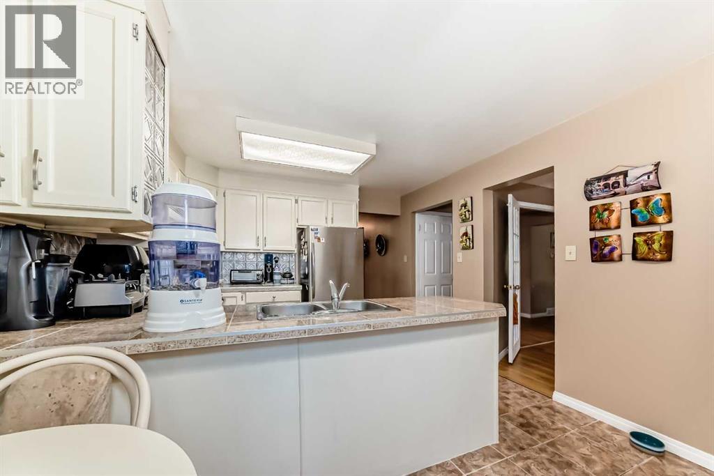 983 Woodbine Boulevard Sw, Calgary, Alberta  T2W 4A7 - Photo 8 - A2255928