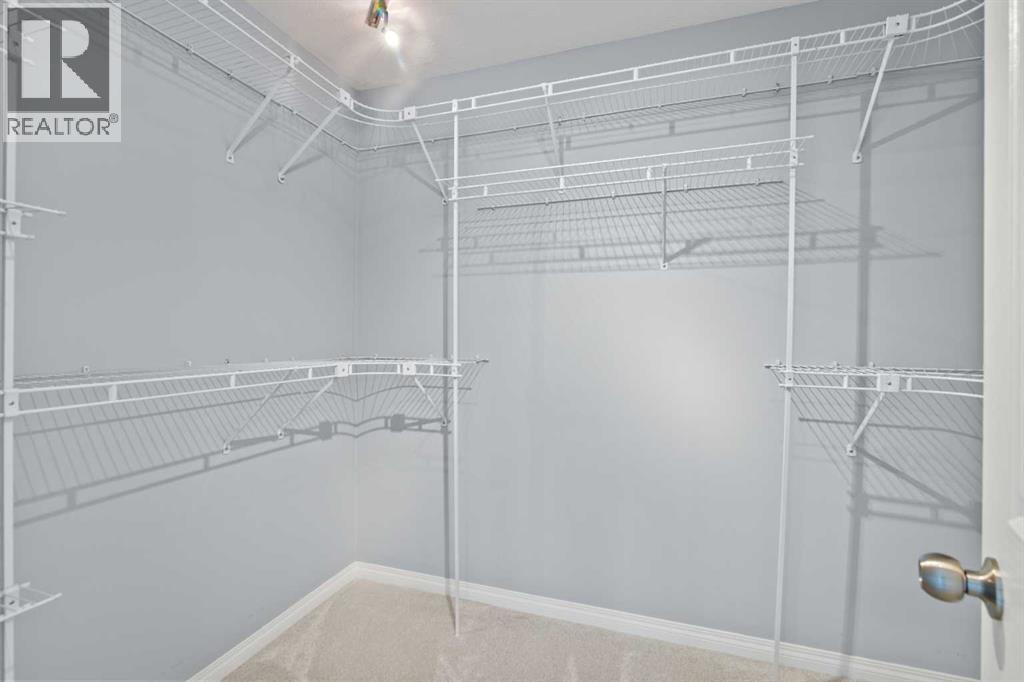 74 Simcrest Manor Sw, Calgary, Alberta  T3H 4K2 - Photo 36 - A2248436