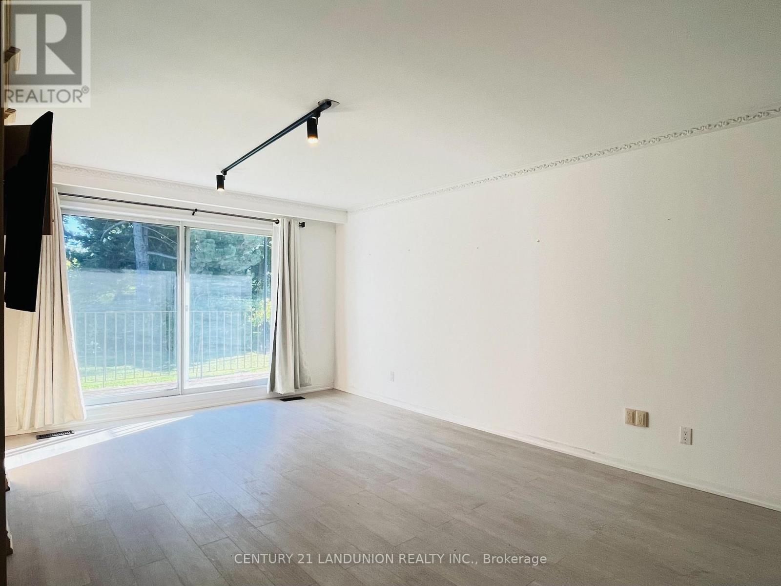 Unit 1 - 1 Caldy Court, Toronto, Ontario  M2L 2J5 - Photo 2 - C12446830