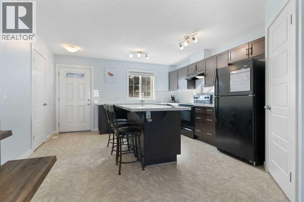 90 Pantego Lane Nw, Calgary, Alberta  T3K 0T1 - Photo 8 - A2259098