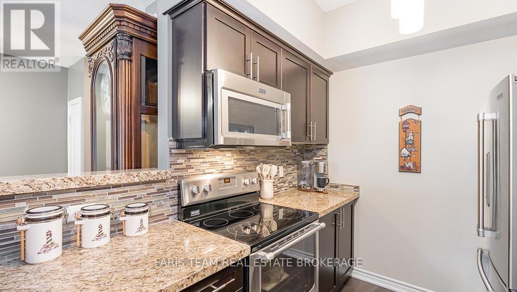 210 - 40 Ferndale Drive S, Barrie (Ardagh), Ontario  L4N 2L3 - Photo 3 - S12447041