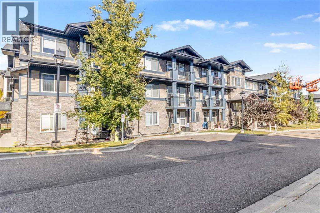 306, 10 Panatella Road Nw, Calgary, Alberta  T3K 0V4 - Photo 2 - A2262400