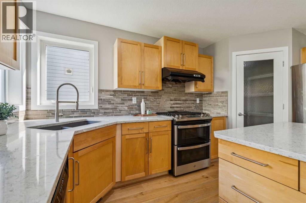 7728 Springbank Way Sw, Calgary, Alberta  T3H 4L8 - Photo 9 - A2249079
