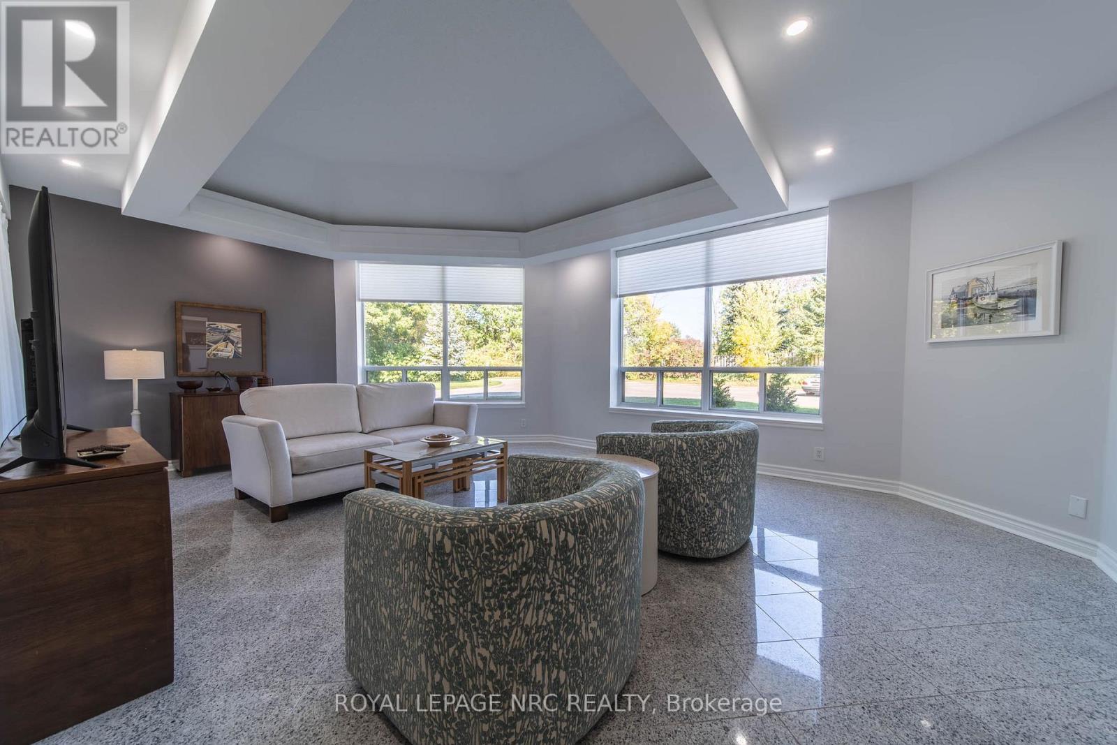 107 - 8111 Forest Glen Drive, Niagara Falls, Ontario  L2H 2Y7 - Photo 2 - X12447306