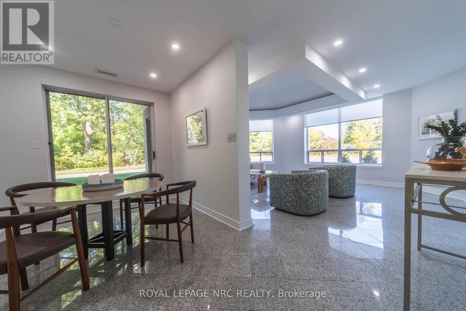 107 - 8111 Forest Glen Drive, Niagara Falls, Ontario  L2H 2Y7 - Photo 3 - X12447306