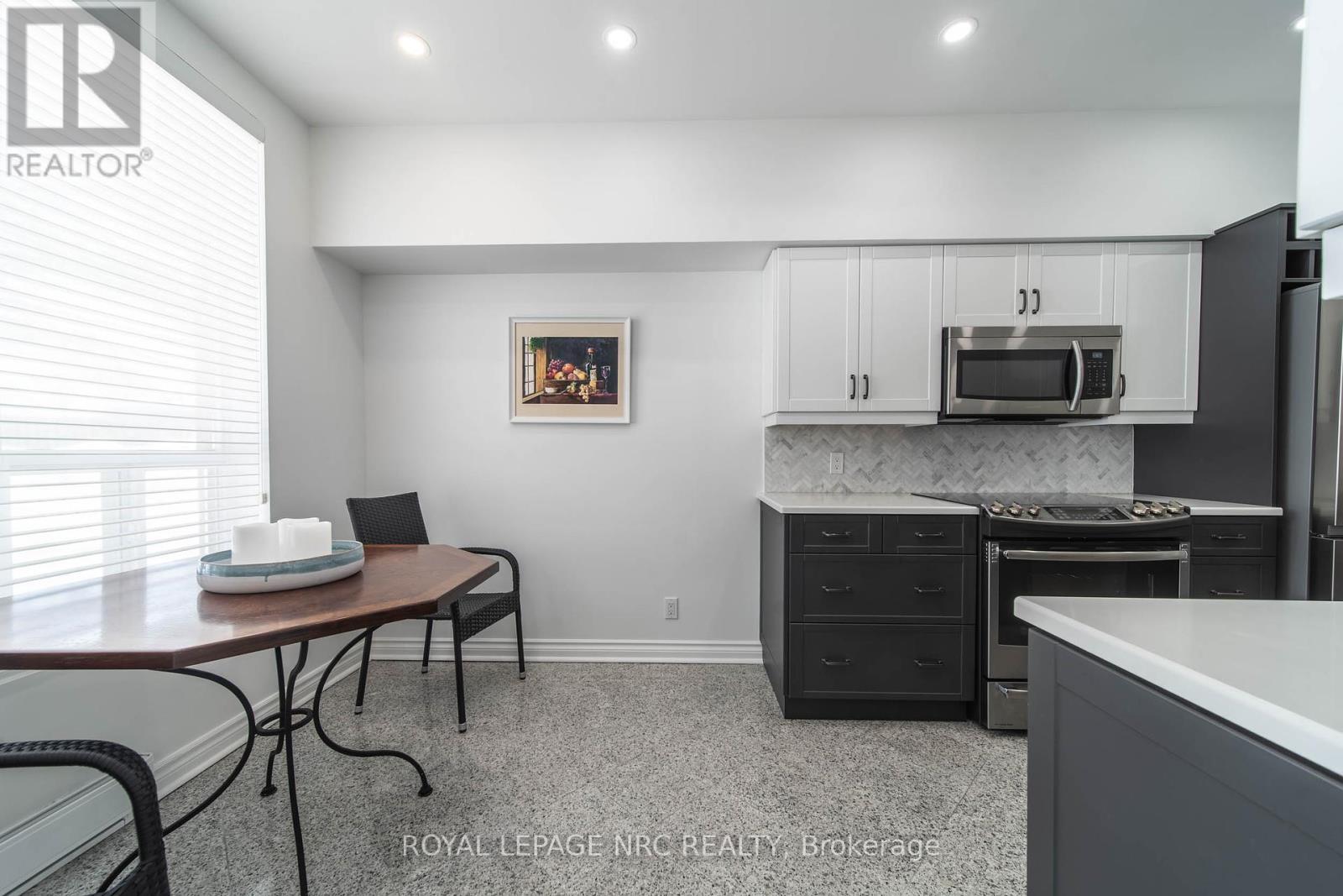 107 - 8111 Forest Glen Drive, Niagara Falls, Ontario  L2H 2Y7 - Photo 6 - X12447306