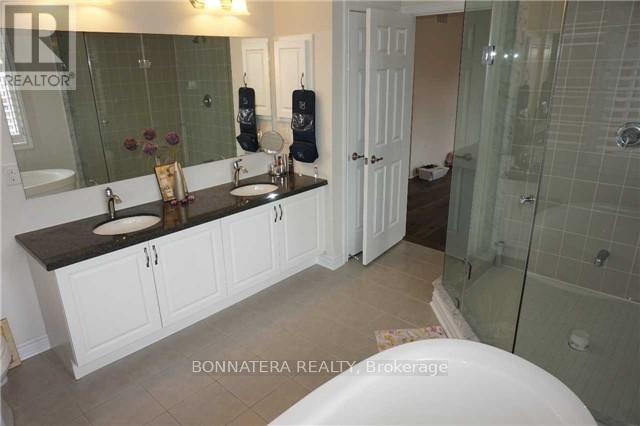 230 Jessie Caverhill Pass, Oakville, Ontario  L6M 0Z6 - Photo 10 - W12446681