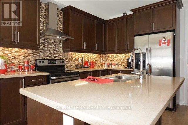 230 Jessie Caverhill Pass, Oakville, Ontario  L6M 0Z6 - Photo 5 - W12446681