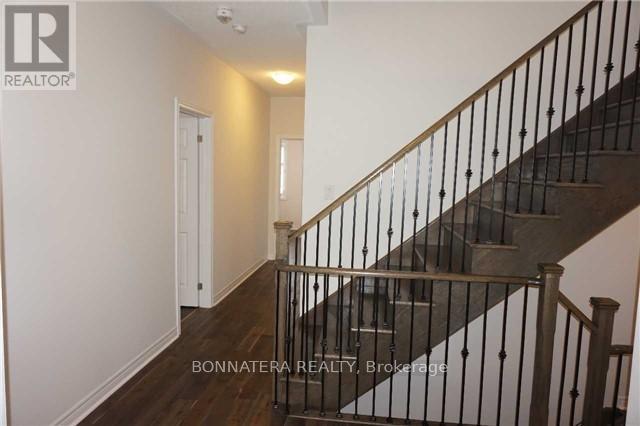 230 Jessie Caverhill Pass, Oakville, Ontario  L6M 0Z6 - Photo 15 - W12446681