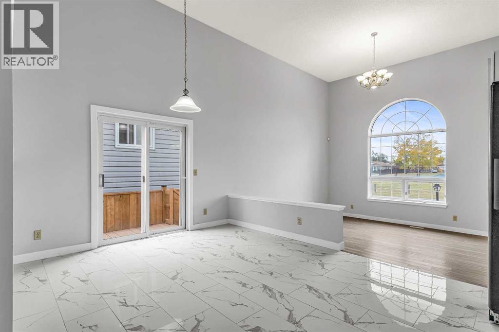 134 Laguna Circle Ne, Calgary, Alberta  T1Y 6W3 - Photo 8 - A2259631