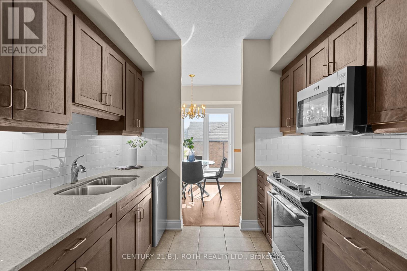 218 - 720 Yonge Street, Barrie (Painswick South), Ontario  L9J 0G9 - Photo 8 - S12447422