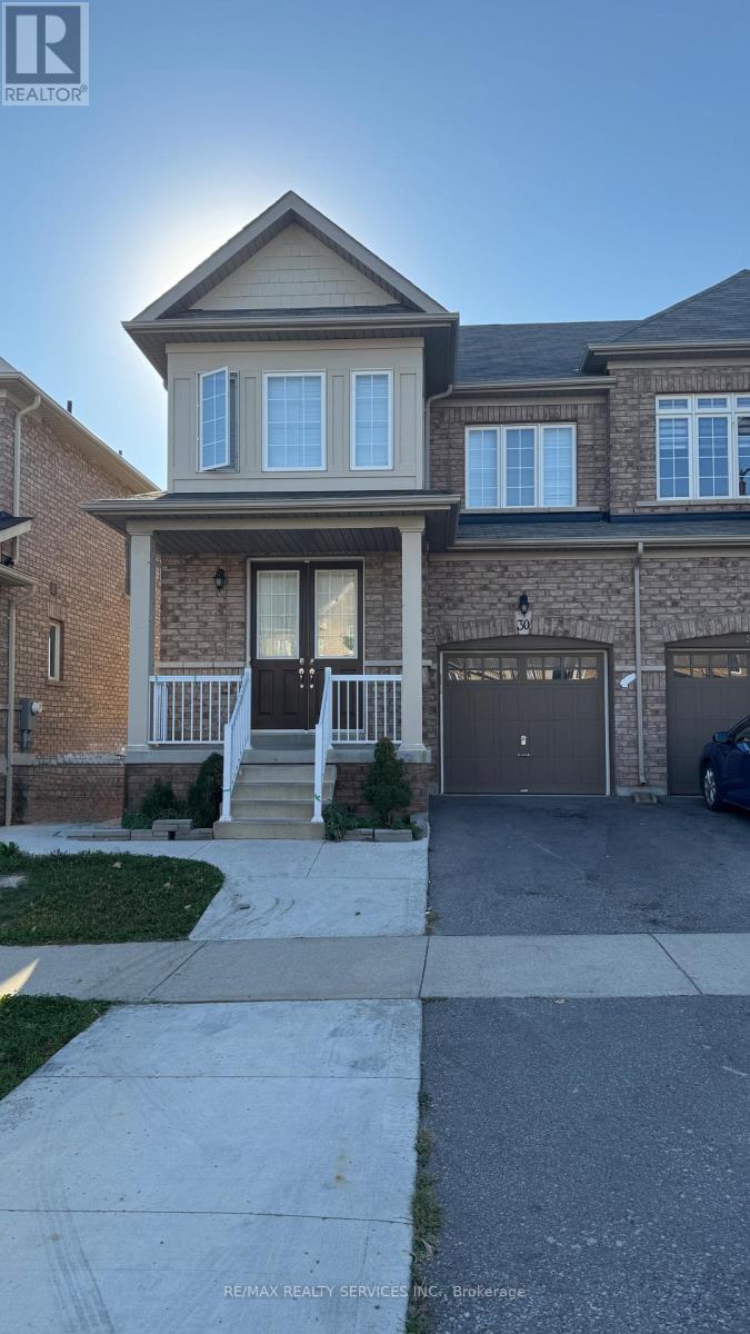 30 Vezna Crescent, Brampton, Ontario  L6X 5K5 - Photo 2 - W12447411