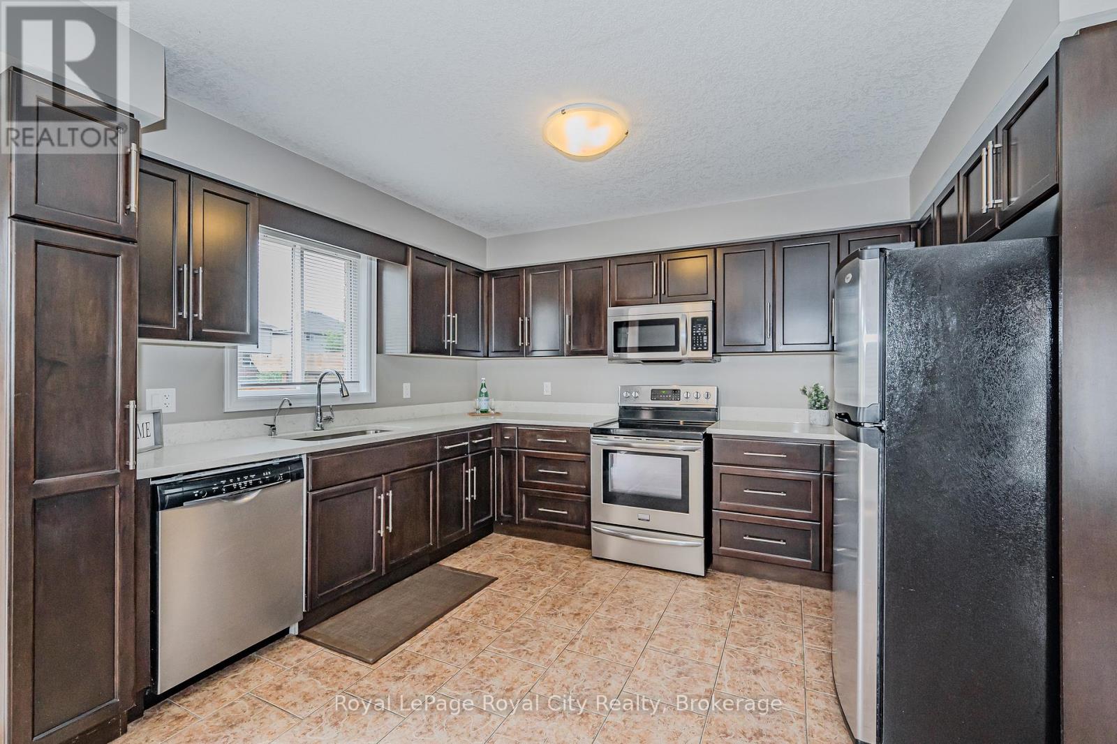 19 - 105 Bard Boulevard, Guelph, Ontario  N1L 0E2 - Photo 6 - X12447550